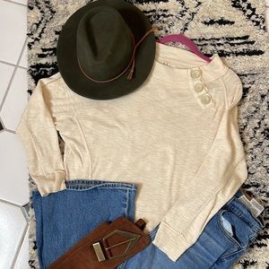 Only worn a couple times Free People cream light sweater.